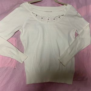 Jennifer Lopez white sweater size large but fits as med